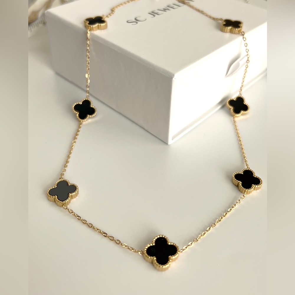 Gold Clover Motif Necklace with Black Accents